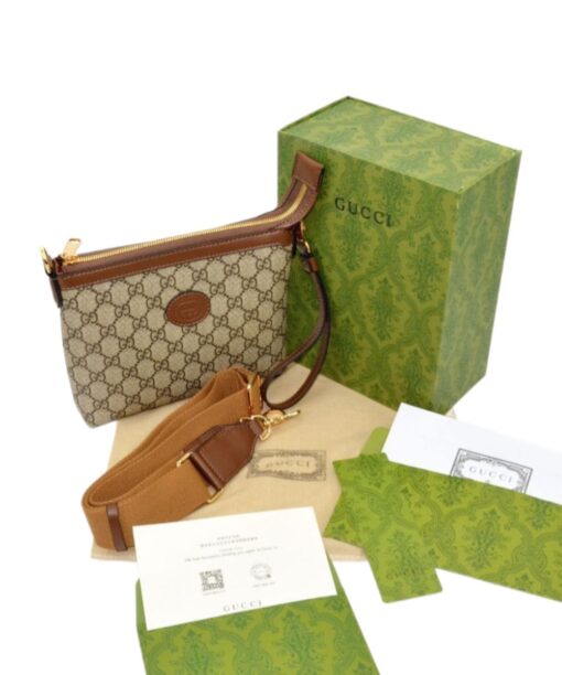 Gucci Supreme Clutch Bag